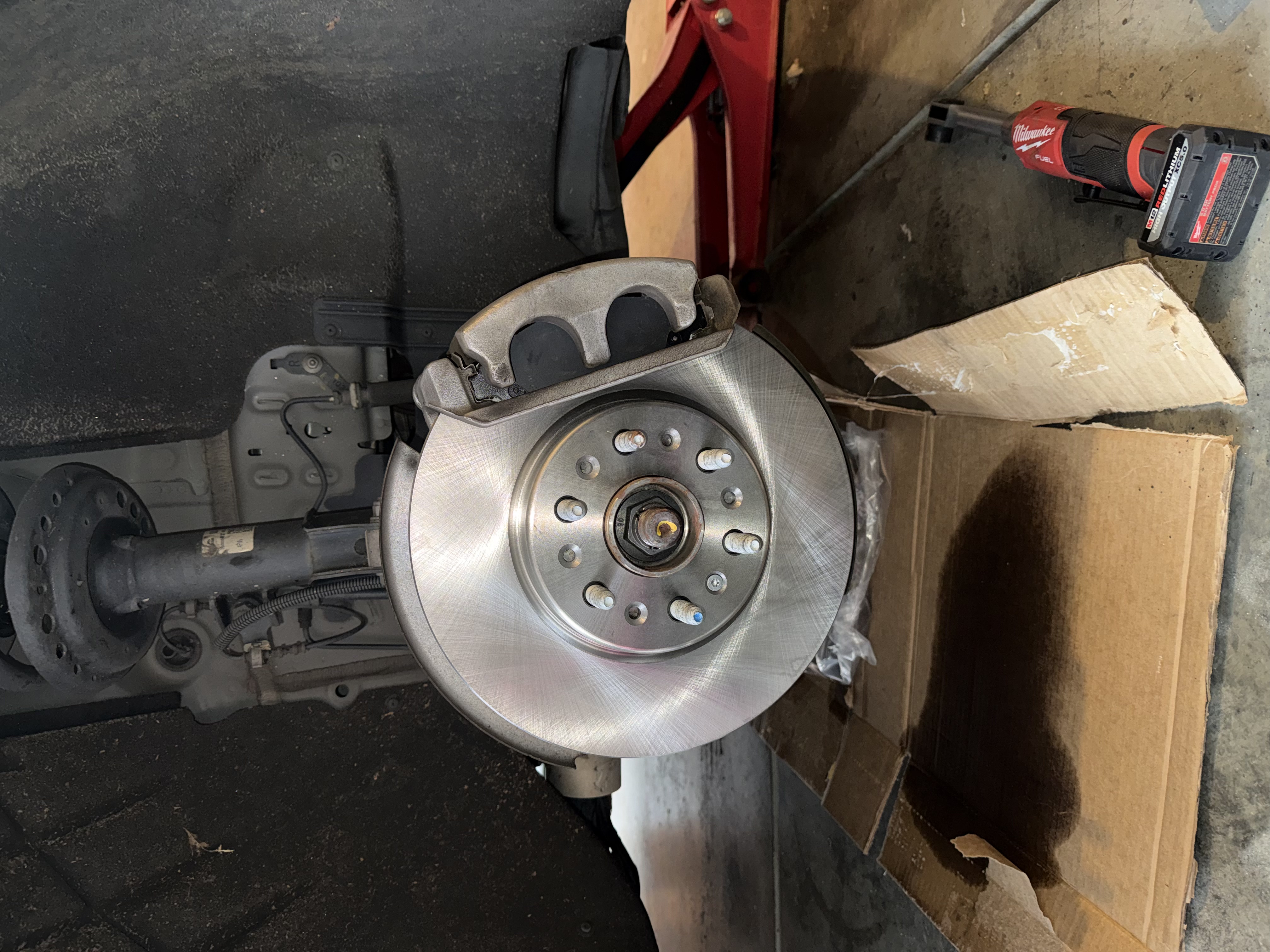 New brake rotor installed during brake service