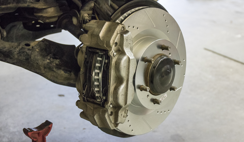 Performance brake rotor and caliper installation